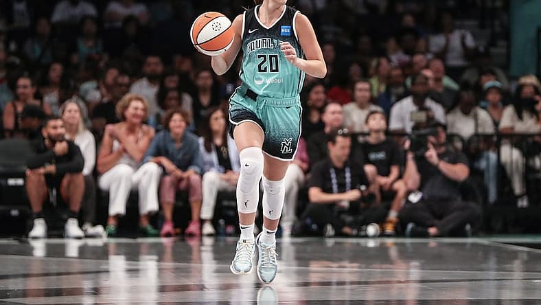 Aug 6, 2023; Brooklyn, New York, USA; New York Liberty guard Sabrina Ionescu (20) brings the ball up in the first quarter against the Las Vegas Aces at Barclays Center. Mandatory Credit: Wendell Cruz-USA TODAY Sports