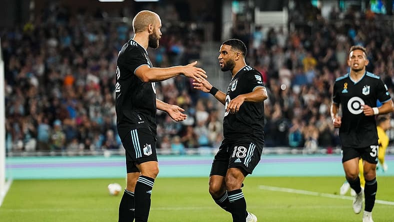 Aug 30, 2023; Saint Paul, Minnesota, USA; Minnesota United forward Teemu Pukki (22) celebrates a goal with forward Ismael Tajouri-Shradi (18) during the first half against Colorado Rapids at Allianz Field. Mandatory Credit: Brace Hemmelgarn-USA TODAY Sports