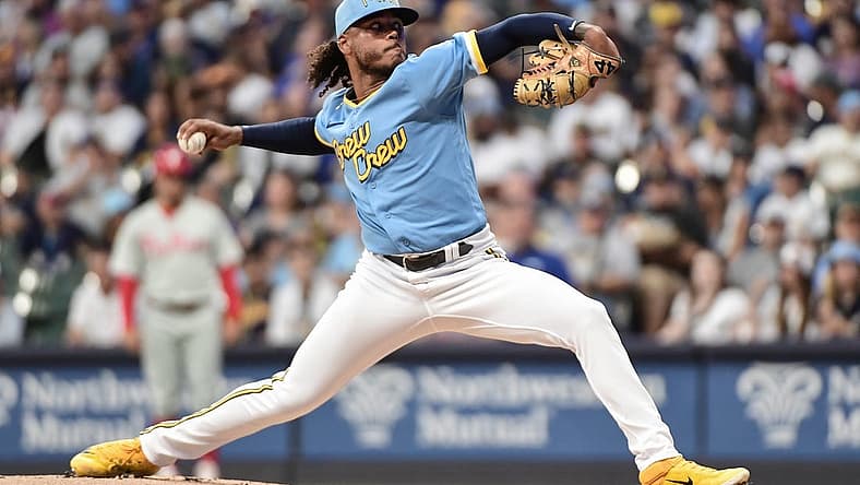 Sep 1, 2023; Milwaukee, Wisconsin, USA; Milwaukee Brewers pitcher Freddy Peralta (51) pitches against the Philadelphia Phillies in the first inning at American Family Field. Mandatory Credit: Benny Sieu-USA TODAY Sports