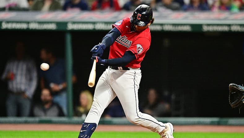 Sep 1, 2023; Cleveland, Ohio, USA; Cleveland Guardians catcher Bo Naylor (23) hits an RBI double during the seventh inning against the Tampa Bay Rays at Progressive Field. Mandatory Credit: Ken Blaze-USA TODAY Sports