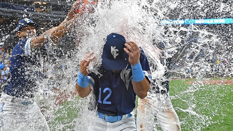 Sep 1, 2023; Kansas City, Missouri, USA; Kansas City Royals designated hitter Nick Loftin (12) gets doused with water following a win over the Boston Red Sox at Kauffman Stadium. Mandatory Credit: Peter Aiken-USA TODAY Sports