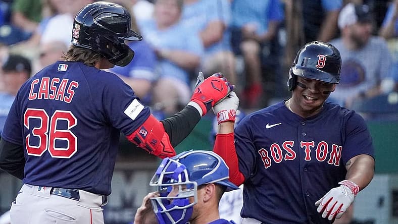 Sep 2, 2023; Kansas City, Missouri, USA; Boston Red Sox first baseman Triston Casas (36) celebrates with third baseman Rafael Devers (11) after hitting a two run home run against the Kansas City Royals in the first inning at Kauffman Stadium. Mandatory Credit: Denny Medley-USA TODAY Sports