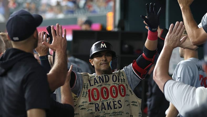 Sep 2, 2023; Arlington, Texas, USA; Minnesota Twins first baseman Donovan Solano (39) is congratulated by his teammates in the dugout after hitting a home run against the Texas Rangers in the third inning at Globe Life Field. Mandatory Credit: Tim Heitman-USA TODAY Sports