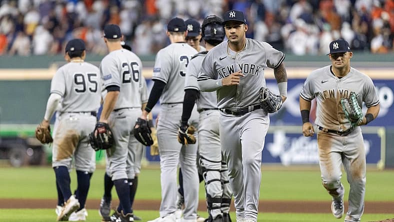 Sep 2, 2023; Houston, Texas, USA; New York Yankees center fielder Jasson Dominguez (89) and teammates celebrate the win against the Houston Astros at Minute Maid Park. Mandatory Credit: Thomas Shea-USA TODAY Sports