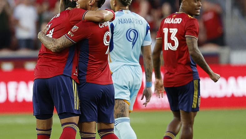 Sep 2, 2023; Sandy, Utah, USA; Real Salt Lake defender Brayan Vera (4) is congratulated by forward Chicho Arango (9) after his first half goal against the Colorado Rapids at America First Field. Mandatory Credit: Jeff Swinger-USA TODAY Sports
