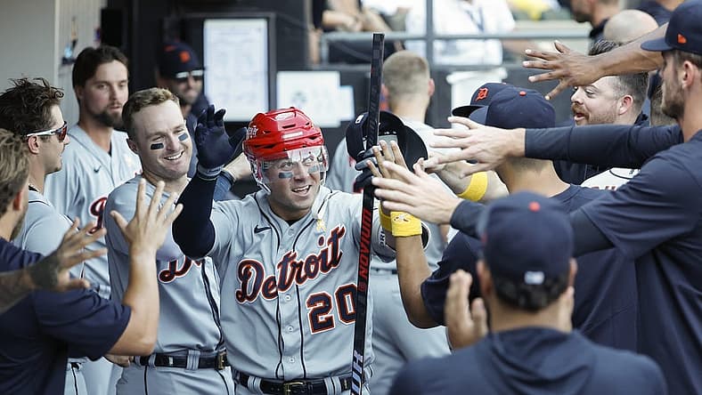 Sep 3, 2023; Chicago, Illinois, USA; Detroit Tigers first baseman Spencer Torkelson (20) celebrates with teammates after hitting a solo home run against the Chicago White Sox during the seventh inning at Guaranteed Rate Field. Mandatory Credit: Kamil Krzaczynski-USA TODAY Sports