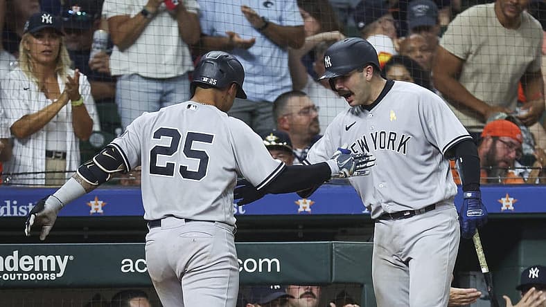Sep 3, 2023; Houston, Texas, USA; New York Yankees second baseman Gleyber Torres (25) celebrates with catcher Austin Wells (88) after hitting a home run during the ninth inning against the Houston Astros at Minute Maid Park. Mandatory Credit: Troy Taormina-USA TODAY Sports