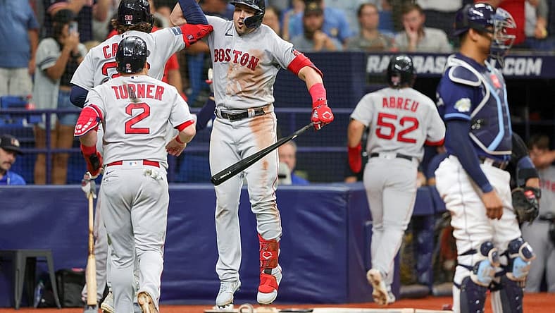 Sep 4, 2023; St. Petersburg, Florida, USA; Boston Red Sox right fielder Adam Duvall (18) congratulates first baseman Triston Casas (36) after hitting a there-run home run against the Tampa Bay Rays in the sixth inning at Tropicana Field. Mandatory Credit: Nathan Ray Seebeck-USA TODAY Sports