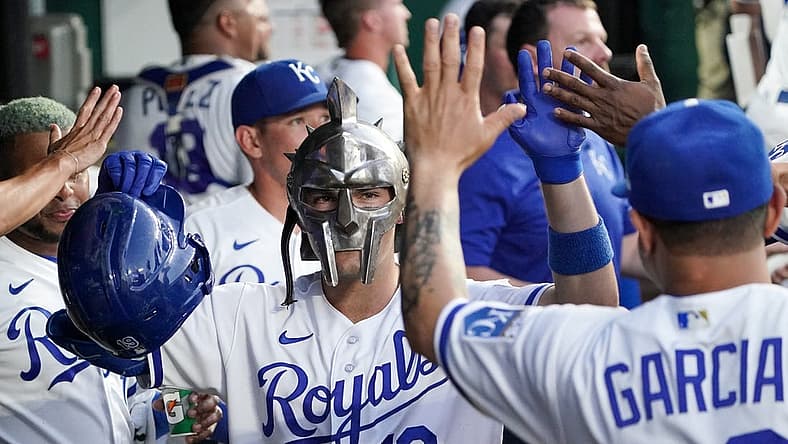 Sep 5, 2023; Kansas City, Missouri, USA; Kansas City Royals second baseman Michael Massey (19) is congratulated in the dugout after hitting a home run against the Chicago White Sox in the fourth inning at Kauffman Stadium. Mandatory Credit: Denny Medley-USA TODAY Sports