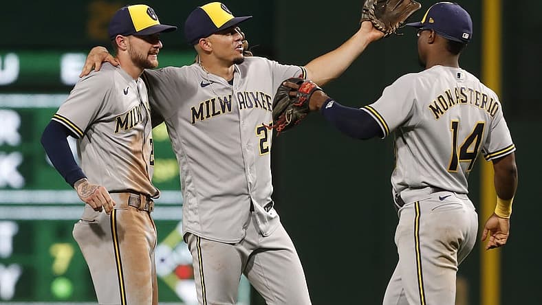 Sep 5, 2023; Pittsburgh, Pennsylvania, USA; Milwaukee Brewers second baseman Brice Turang (2) and shortstop Willy Adames (27) and third baseman Andruw Monasterio (14) celebrate after defeating the Pittsburgh Pirates at PNC Park. The Brewers won 7-3. Mandatory Credit: Charles LeClaire-USA TODAY Sports