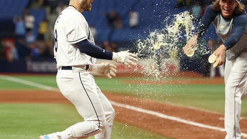 Sep 5, 2023; St. Petersburg, Florida, USA; Tampa Bay Rays second baseman Brandon Lowe (8) celebrates after he hit a three run walk off home run during the eleventh inning against the Boston Red Sox at Tropicana Field. Mandatory Credit: Kim Klement Neitzel-USA TODAY Sports