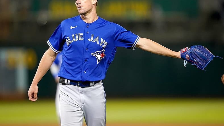 Sep 5, 2023; Oakland, California, USA; Toronto Blue Jays pitcher Chris Bassitt (40) is congratulated by teammates after the Blue Jays recorded the final out of the fifth inning against the Oakland Athletics at Oakland-Alameda County Coliseum. Mandatory Credit: Cary Edmondson-USA TODAY Sports