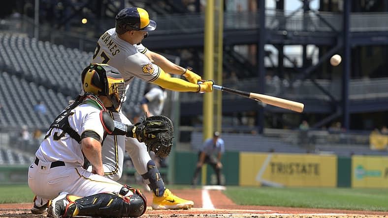 Sep 6, 2023; Pittsburgh, Pennsylvania, USA; Milwaukee Brewers shortstop Willy Adames (27) hits a three run home run against the Pittsburgh Pirates during the first inning at PNC Park. Mandatory Credit: Charles LeClaire-USA TODAY Sports