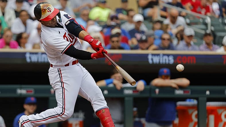Sep 9, 2023; Minneapolis, Minnesota, USA; Minnesota Twins first baseman Donovan Solano (39) hits a two-run single against the New York Mets in the second inning at Target Field. Mandatory Credit: Bruce Kluckhohn-USA TODAY Sports