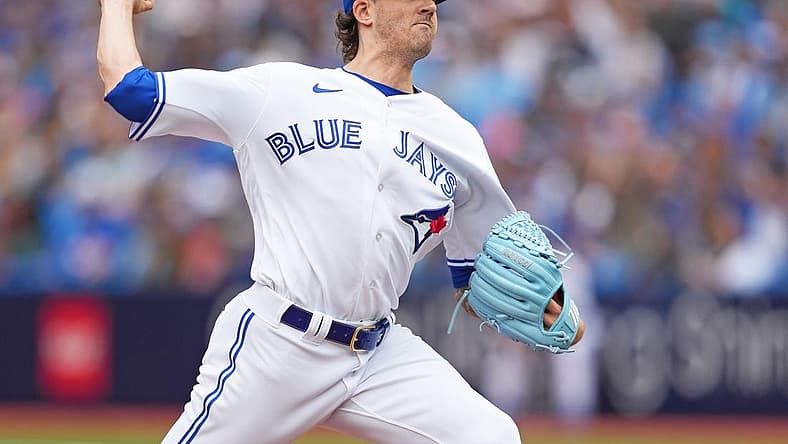 Sep 9, 2023; Toronto, Ontario, CAN; Toronto Blue Jays starting pitcher Kevin Gausman (34) pitches against the Kansas City Royals during the first inning at Rogers Centre. Mandatory Credit: Nick Turchiaro-USA TODAY Sports