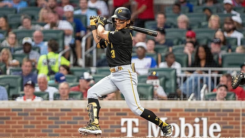 Sep 9, 2023; Cumberland, Georgia, USA; Pittsburgh Pirates second baseman Ji Hwan Bae (3) hits single against Atlanta Braves at Truist Park. Mandatory Credit: Jordan Godfree-USA TODAY Sports