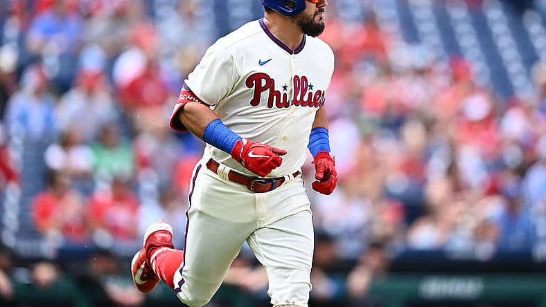 Sep 10, 2023; Philadelphia, Pennsylvania, USA; Philadelphia Phillies outfielder Kyle Schwarber (12) advances to first after hitting a single against the Miami Marlins in the first inning at Citizens Bank Park. Mandatory Credit: Kyle Ross-USA TODAY Sports