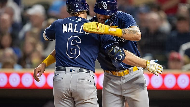 Sep 11, 2023; Minneapolis, Minnesota, USA; Tampa Bay Rays shortstop Taylor Walls (6) celebrates with center fielder Jose Siri (22) after hitting a three run home run against the Minnesota Twins in the fifth inning at Target Field. Mandatory Credit: Jesse Johnson-USA TODAY Sports