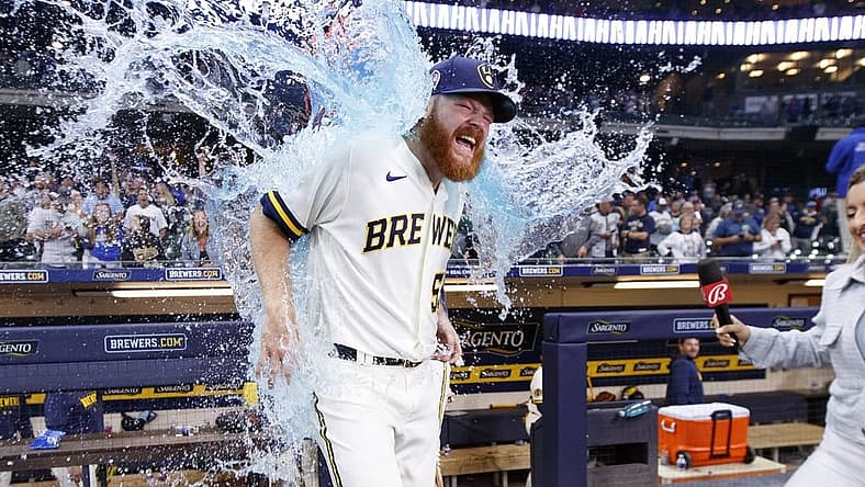 Sep 11, 2023; Milwaukee, Wisconsin, USA; Milwaukee Brewers pitcher Brandon Woodruff (53) gets dunked with Gatorade following the game against the Miami Marlins at American Family Field. Mandatory Credit: Jeff Hanisch-USA TODAY Sports