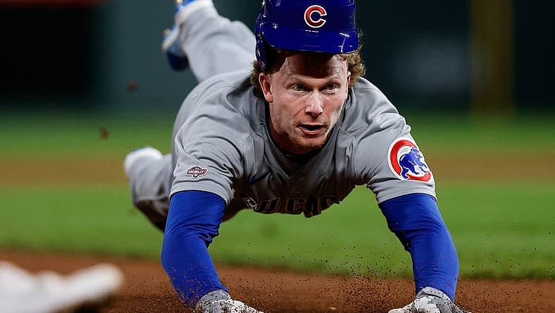 Sep 11, 2023; Denver, Colorado, USA; Chicago Cubs outfielder Pete Crow-Armstrong (52) attempts to steal third base in the seventh inning against the Colorado Rockies at Coors Field. Mandatory Credit: Isaiah J. Downing-USA TODAY Sports