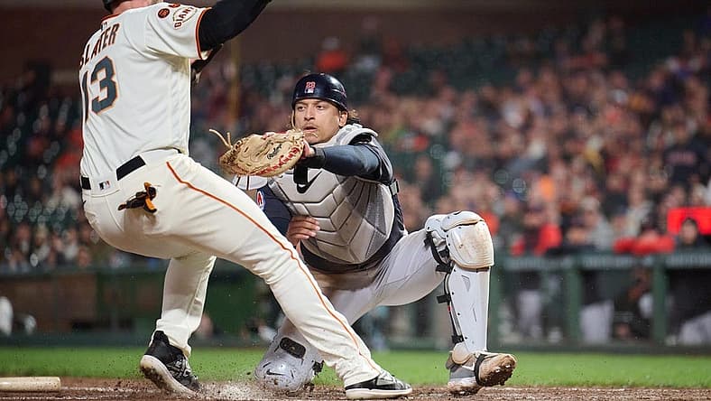 Sep 11, 2023; San Francisco, California, USA; Cleveland Guardians catcher Bo Naylor (23) tags out San Francisco Giants outfielder Austin Slater (13) on a force play at home plate during the seventh inning at Oracle Park. Mandatory Credit: Robert Edwards-USA TODAY Sports