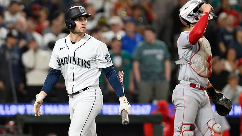 Sep 11, 2023; Seattle, Washington, USA; Seattle Mariners right fielder Jarred Kelenic (10) walks off the field after striking out to the Los Angeles Angels during the ninth inning at T-Mobile Park. Mandatory Credit: Steven Bisig-USA TODAY Sports