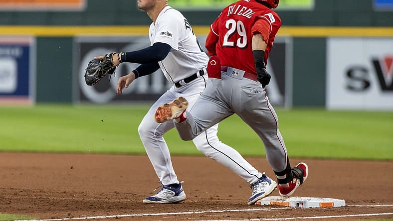 Sep 13, 2023; Detroit, Michigan, USA; Cincinnati Reds center fielder TJ Friedl (29) beats the throw to Detroit Tigers first baseman Spencer Torkelson (20) in the fourth inning at Comerica Park. Mandatory Credit: David Reginek-USA TODAY Sports