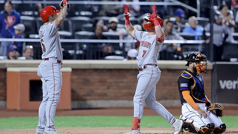 Sep 15, 2023; New York City, New York, USA; Cincinnati Reds first baseman Spencer Steer (7) celebrates his two run home run against the New York Mets with third baseman Nick Senzel (15) during the sixth inning at Citi Field. Mandatory Credit: Brad Penner-USA TODAY Sports