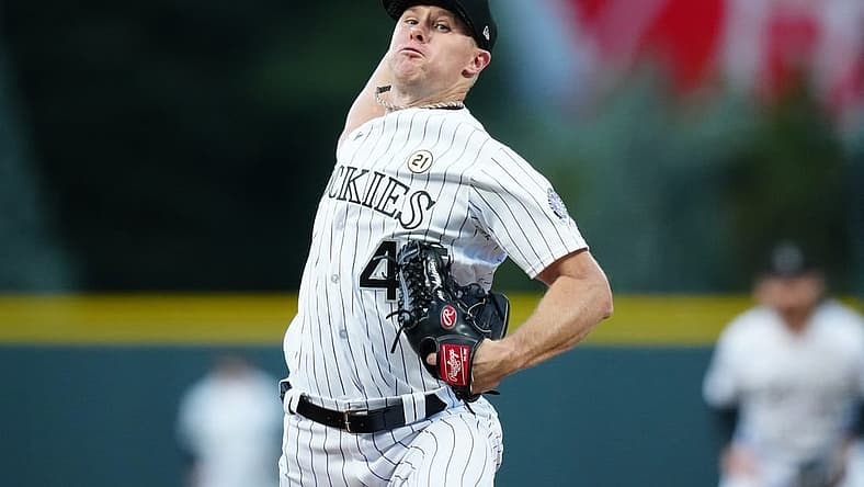 Sep 15, 2023; Denver, Colorado, USA; Colorado Rockies starting pitcher Chase Anderson (45) delivers a pitch in the first inning against the San Francisco Giants at Coors Field. Mandatory Credit: Ron Chenoy-USA TODAY Sports