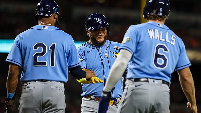 Sep 15, 2023; Baltimore, Maryland, USA; Tampa Bay Rays designated hitter Harold Ramirez (43) celebrates with center fielder Manuel Margot (13) and third baseman Taylor Walls (6) after hitting a three run home run against the Baltimore Orioles during the sixth inning at Oriole Park at Camden Yards. Mandatory Credit: Scott Taetsch-USA TODAY Sports