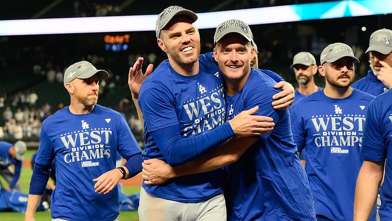 Sep 16, 2023; Seattle, Washington, USA; The Los Angeles Dodgers celebrate after winning the National League West division after the game against the Seattle Mariners at T-Mobile Park. Mandatory Credit: Steven Bisig-USA TODAY Sports