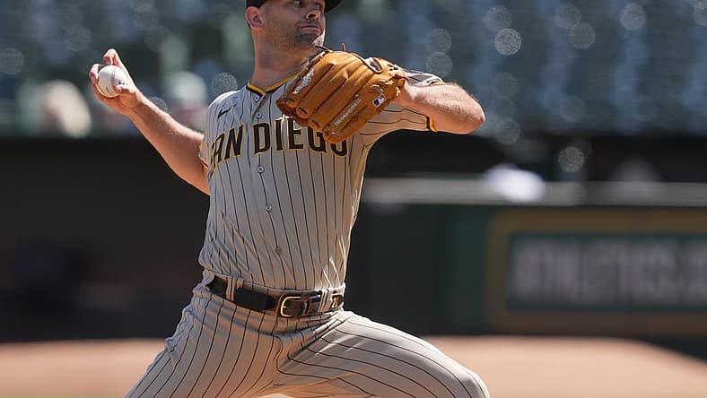 Sep 17, 2023; Oakland, California, USA; San Diego Padres starting pitcher Nick Martinez (21) throws a pitch against the Oakland Athletics during the first inning at Oakland-Alameda County Coliseum. Mandatory Credit: Darren Yamashita-USA TODAY Sports