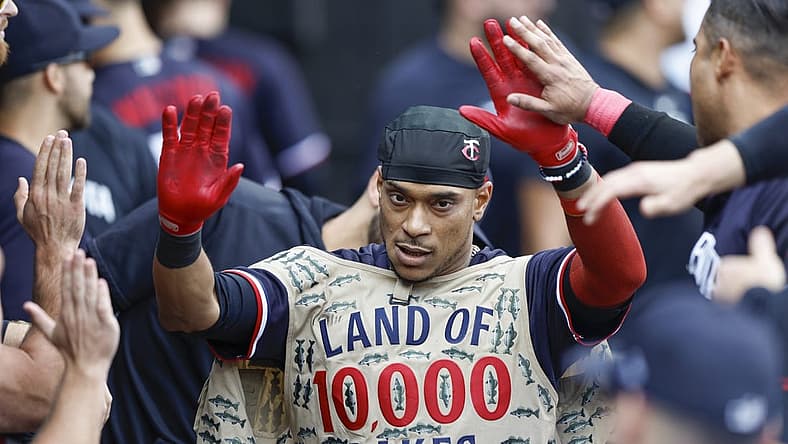 Sep 17, 2023; Chicago, Illinois, USA; Minnesota Twins second baseman Jorge Polanco (11) celebrates with teammates in the dugout after hitting a solo home run against the Chicago White Sox during the eight inning at Guaranteed Rate Field. Mandatory Credit: Kamil Krzaczynski-USA TODAY Sports