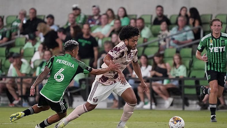 Sep 17, 2023; Austin, Texas, USA; Portland Timbers midfielder Evander (20) dribbles against Austin FC midfielder Daniel Pereira (6) during the second half at Q2 Stadium. Mandatory Credit: Scott Wachter-USA TODAY Sports