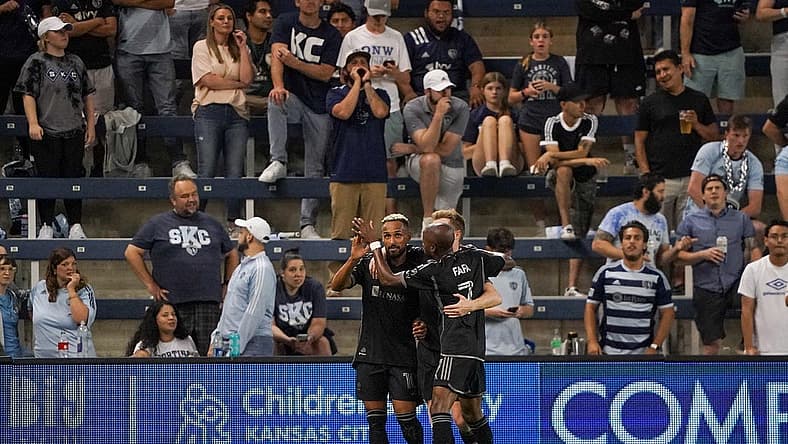 Sep 20, 2023; Kansas City, Kansas, USA; Nashville SC midfielder Hany Mukhtar (10) celebrates his goal scored against Sporting Kansas City with midfielder Dax McCarty (6) and midfielder Fafa Picault (7) during the second half at Children's Mercy Park. Mandatory Credit: Denny Medley-USA TODAY Sports