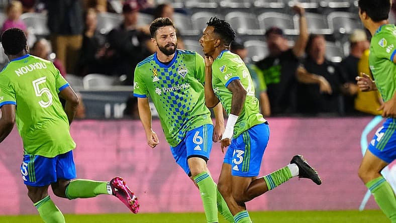 Sep 20, 2023; Commerce City, Colorado, USA; Seattle Sounders midfielder Joao Paulo (6) and Leo Chu (23) celebrate a goal in the first half at Dick's Sporting Goods Park. Mandatory Credit: Ron Chenoy-USA TODAY Sports