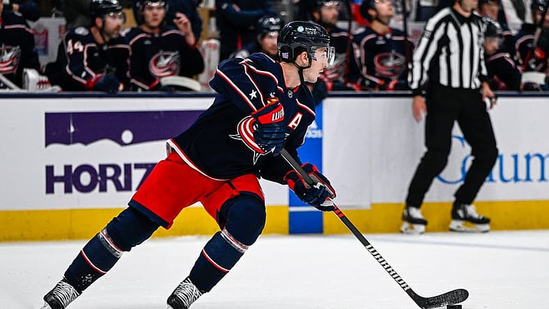 Nov 10, 2022; Columbus, Ohio, USA; Columbus Blue Jackets defenseman Zach Werenski (8) skates with the puck against the Philadelphia Flyers in the first period at Nationwide Arena. Mandatory Credit: Gaelen Morse-USA TODAY Sports