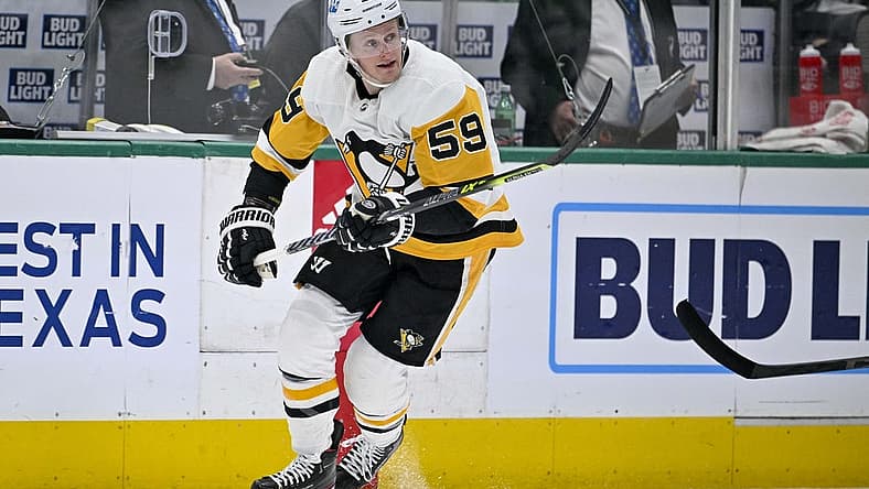 Mar 23, 2023; Dallas, Texas, USA; Pittsburgh Penguins left wing Jake Guentzel (59) in action during the game between the Dallas Stars and the Pittsburgh Penguins at American Airlines Center. Mandatory Credit: Jerome Miron-USA TODAY Sports