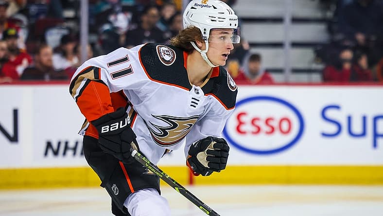 Apr 2, 2023; Calgary, Alberta, CAN; Anaheim Ducks center Trevor Zegras (11) skates against the Calgary Flames during the first period at Scotiabank Saddledome. Mandatory Credit: Sergei Belski-USA TODAY Sports