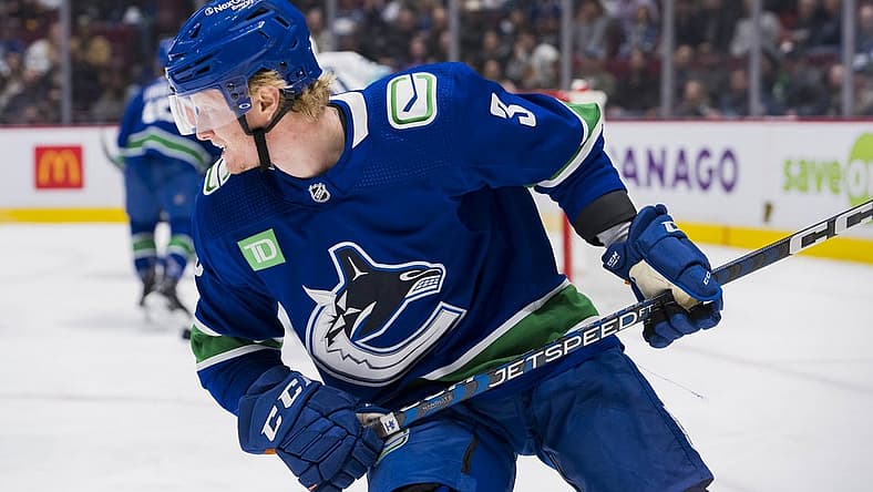Apr 4, 2023; Vancouver, British Columbia, CAN; Vancouver Canucks defenseman Jack Rathbone (3) skates against the Seattle Kraken in the third period at Rogers Arena. Mandatory Credit: Bob Frid-USA TODAY Sports
