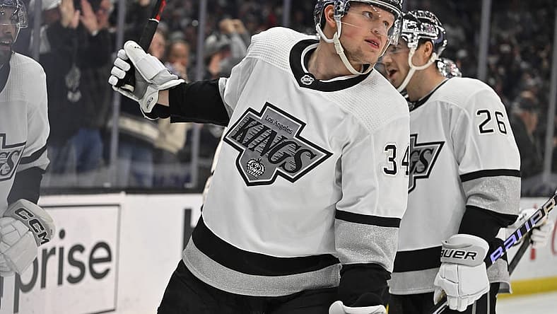 Apr 10, 2023; Los Angeles, California, USA; Los Angeles Kings right wing Arthur Kaliyev (34) celebrates after scoring a goal in the second period against the Vancouver Canucks at Crypto.com Arena. Mandatory Credit: Jayne Kamin-Oncea-USA TODAY Sports