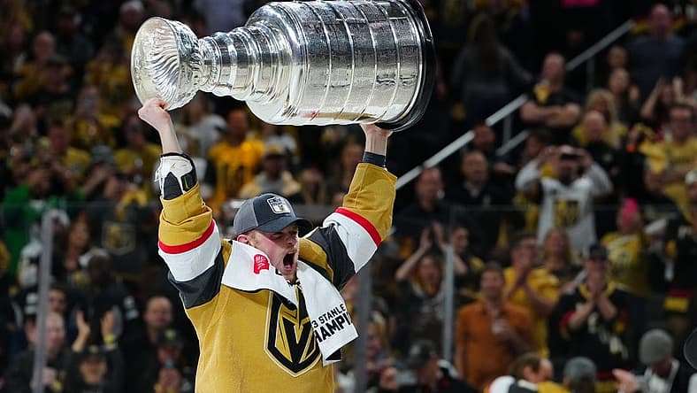 Jun 13, 2023; Las Vegas, Nevada, USA; Vegas Golden Knights forward Jack Eichel (9) hoists the Stanley Cup after defeating the Florida Panthers in game five of the 2023 Stanley Cup Final at T-Mobile Arena. Mandatory Credit: Stephen R. Sylvanie-USA TODAY Sports