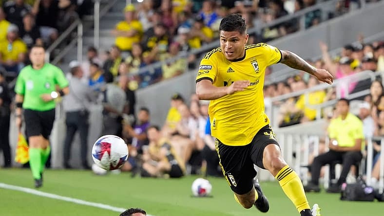 Jul 31, 2023; Columbus, OH, USA; Columbus Crew forward Cucho Hernandez (9) gets around the sliding tackle of Club America midfielder Richard Sanchez (20) during the first half of the League Cup group match at Lower.com Field.