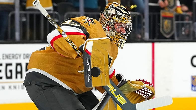 Sep 27, 2023; Las Vegas, Nevada, USA; Vegas Golden Knights goaltender Adin Hill (33) warms up before a preseason game against the Los Angeles Kings at T-Mobile Arena. Mandatory Credit: Stephen R. Sylvanie-USA TODAY Sports