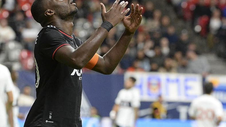 Sep 30, 2023; Vancouver, British Columbia, CAN; D.C. United forward Christian Benteke (20) reacts during the second half against the Vancouver Whitecaps FC at BC Place. Mandatory Credit: Anne-Marie Sorvin-USA TODAY Sports
