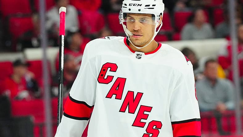 Sep 26, 2023; Raleigh, North Carolina, USA; Carolina Hurricanes defensemen Caleb Jones (6) looks on against the Tampa Bay Lightning during the second period at PNC Arena. Mandatory Credit: James Guillory-USA TODAY Sports