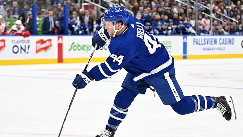 Oct 5, 2023; Toronto, Ontario, CAN; Toronto Maple Leafs defenseman Morgan Rielly (44) shoots the puck against the Detroit Red Wings in the first period at Scotiabank Arena. Mandatory Credit: Dan Hamilton-USA TODAY Sports