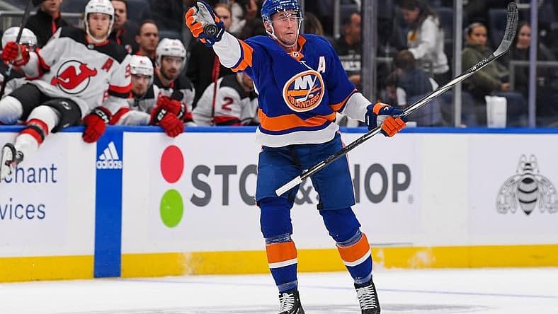 Oct 6, 2023; Elmont, New York, USA; New York Islanders Center Brock Nelson (29) catches the puck New Jersey Devils during the first period at UBS Arena. Mandatory Credit: Dennis Schneidler-USA TODAY Sports