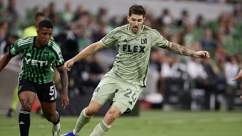 Oct 7, 2023; Austin, Texas, USA; Los Angeles FC midfielder Ryan Hollingshead (24) dribbles the ball during the first half at Q2 Stadium. Mandatory Credit: Erich Schlegel-USA TODAY Sports