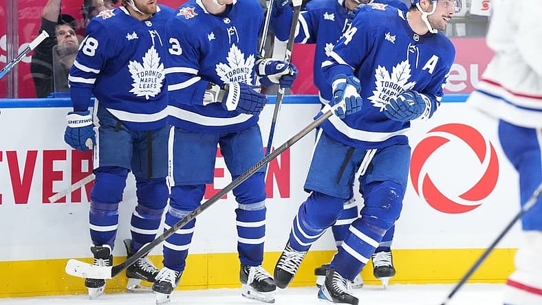 Oct 11, 2023; Toronto, Ontario, CAN; Toronto Maple Leafs center Auston Matthews (34) celebrates scoring his third goal of the game against the Montreal Canadiens during the third period at Scotiabank Arena. Mandatory Credit: Nick Turchiaro-USA TODAY Sports
